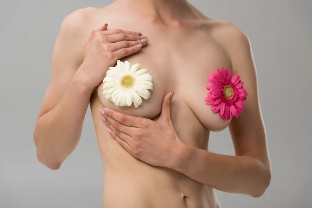 partial-view-of-naked-young-woman-with-flowers-iso-2026-03-11-04-18-17-utc